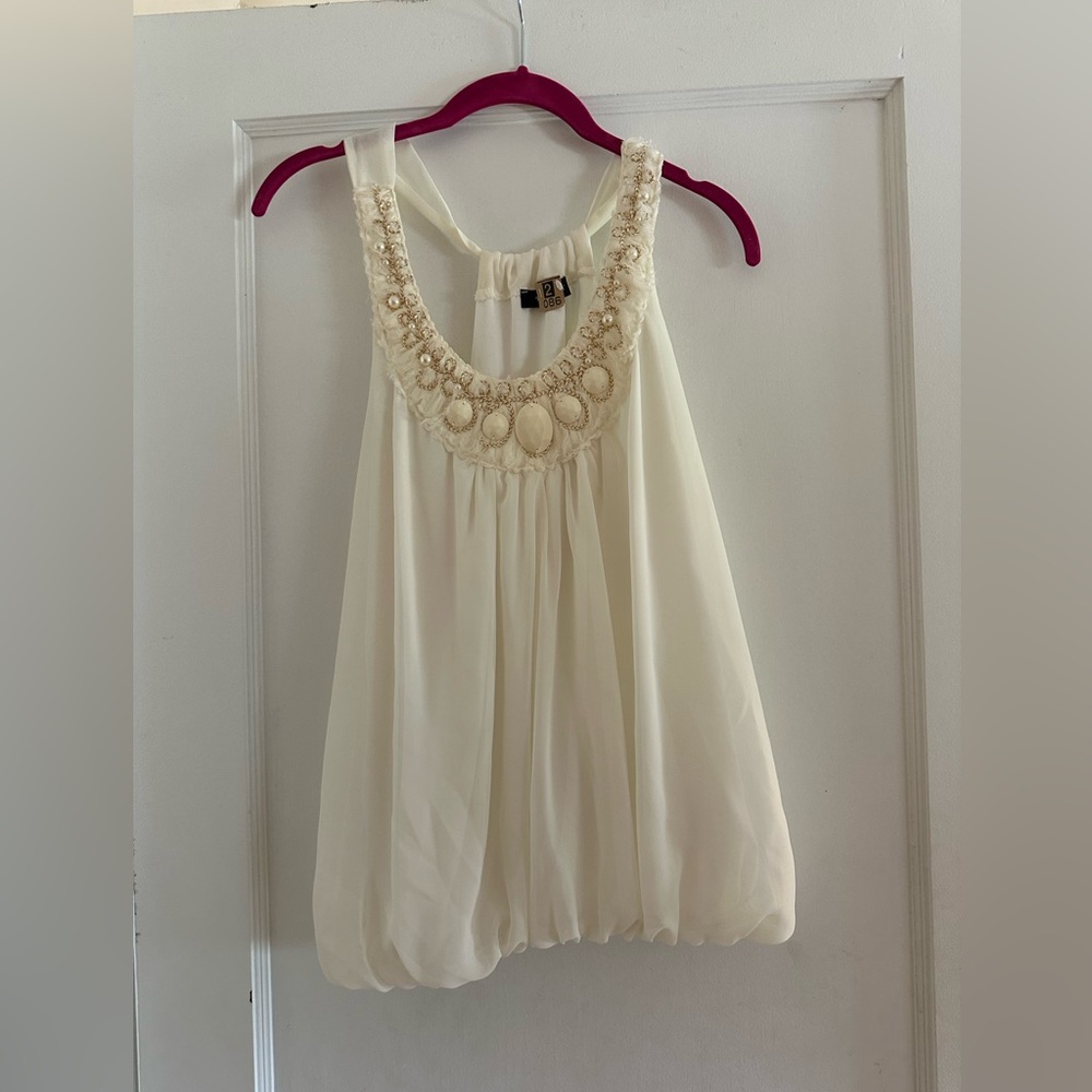 Silk feel cream beaded tank .